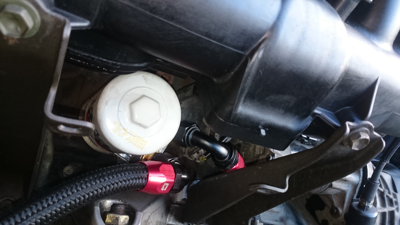 Filter in. Had to loosen the sandwich plate and shove it across to get the filter to screw on. Fiddly bastard, but even more proof that doing this with the engine out was the right call.